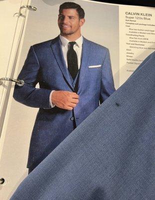 Salesperson repeatedly tried to convince me these 2 suits were the same color