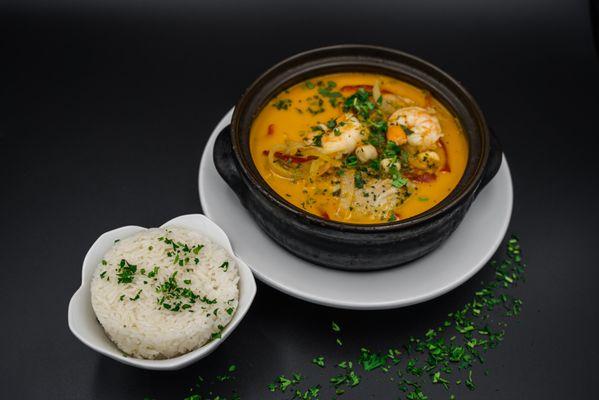 Moqueca GF  
Mahi-mahi, shrimp, and scallops, garlic, onions, Dendê (palm oil), red bell peppers, fresh herbs and spices stew.