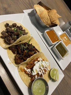 Salsa sampler, Carne asada (beef steak) Tacos, Tacos al Pastor, Tinga de Pollo Tacos.