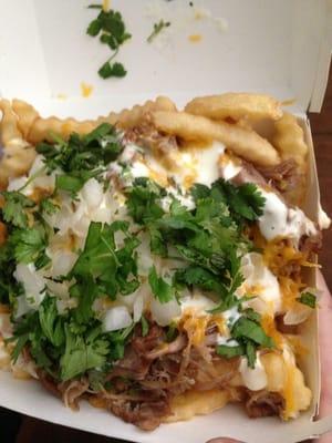 Loaded carnitas fries... Just need to get them to wrap them in a tortilla