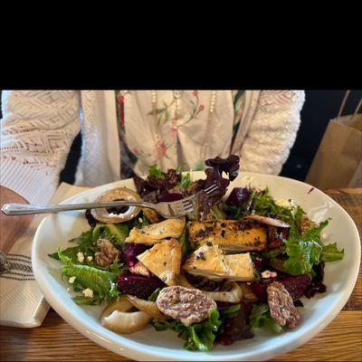 Hearty greens salad with chicken.