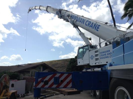 Crane operator maneuvers with great skill!