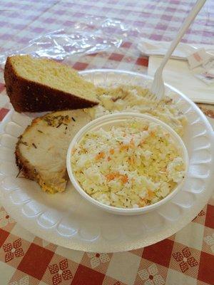 Herb roasted pork loin mashed potatoes and coleslaw and a side of cornbread.