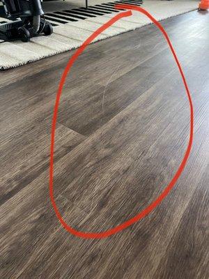 Massive scratch on my BRAND NEW floors