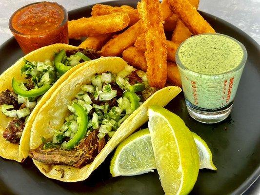 Braised chimichurri beef tacos with yuca fries