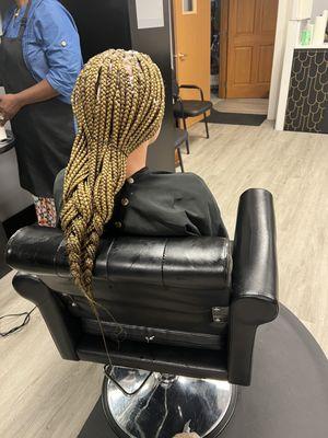 Blonde medium box braids.