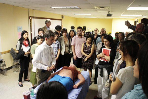 Dr. Paul F. Ryan teaching abdominal acupuncture at the Pacific College of Health Sciences in 2016.