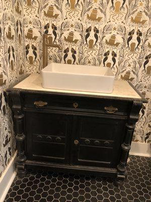 Custom bathroom vanity made from antique dresser by Waterfront Home Improvement