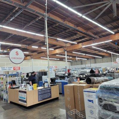 Cashier with a lot of appliances to choose from.