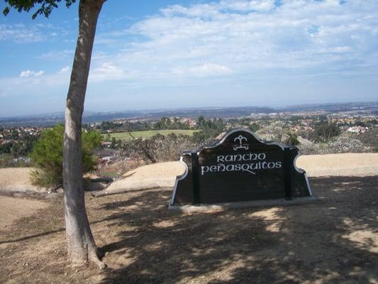 The original wooden Community sign now sitting on Hilltop Park