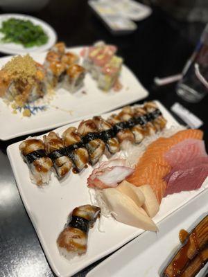 Some rolls, Eel nigiris, and Octopus, White Tuna, Salmon, Red Snapper and Tuna Sashimi