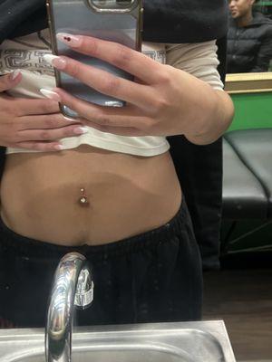 belly button piercing $65