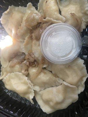 Potato and Potato, Cheese & Onions Pierogi!! Delicious and you have to try it.