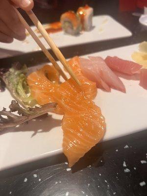 This is supposed to be salmon sashimi. It was extremely slimy.