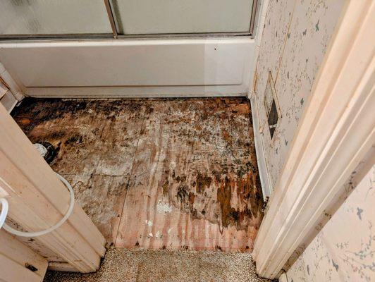 One of the bathroom floors what had ceramic tile installed in a mud bed