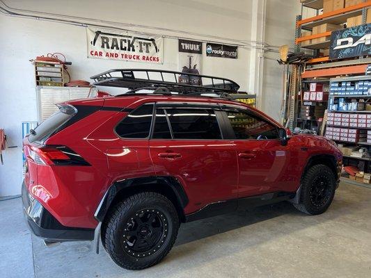 Thule canyon xt roof basket with extension on a 2021 Toyota RAV4 prime.