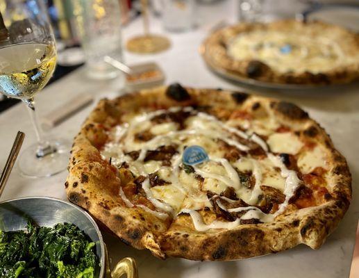 Wildly decadent pizza with fried eggplant and fondue.