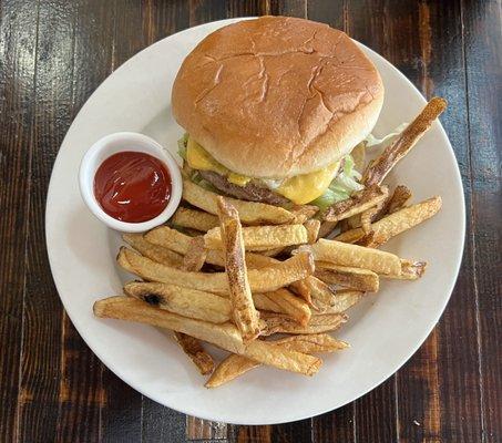 Cheeseburger and fries. Tastes delicious and homemade.