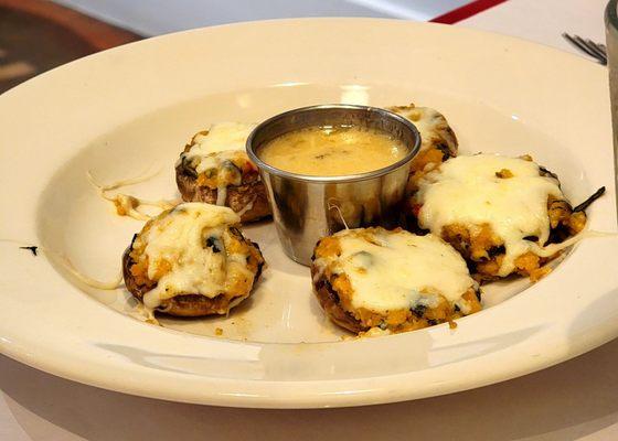 Stuffed mushroom appetizer with dipping sauce