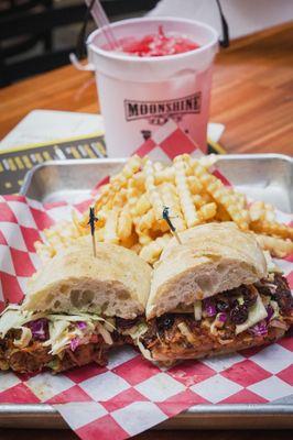 Pulled Pork Sandwich * pulled pork, bbq sauce, apple-cranberry coleslaw, crispy onions, ciabatta bun