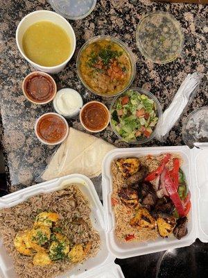 Lentil soup, Chicken Beef and Lamb Shawarma Plate, Shrimp in Garlic Sauce, Fava Bean Appetizer and Pita Bread.