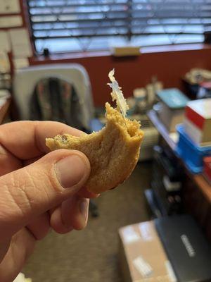 Cookie with paper baked into it. Good quality control BIG Y.