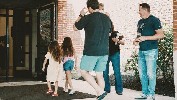 Family walking into church