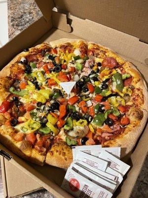 Garden veggie pizza with ham, bacon and sausage