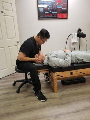 Chiropractic adjustment by Dr. Ro