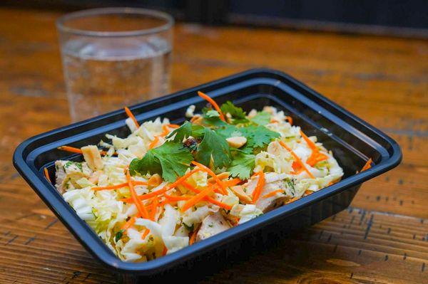 Sesame Chicken salad: Butter Lettuce, shaved carrots, sesame vinaigrette, cilantro, peanuts, grilled chickens.