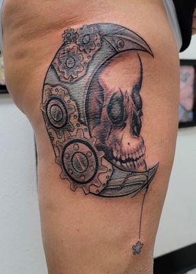 Biomechanical moon/skull tattoo done recently by artist/owner Jarrod text 6823651277 for booking availability.