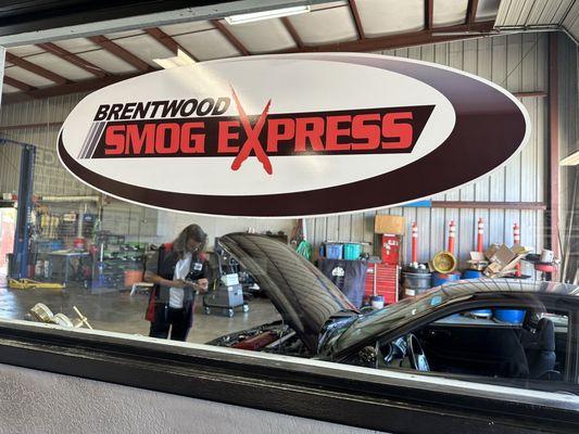 My Acura Integra Type R in for smog testing and Brentwood Smog Express.