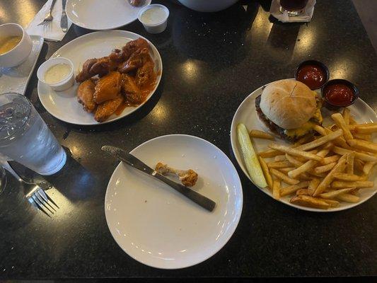 Wings, a burger and fries.