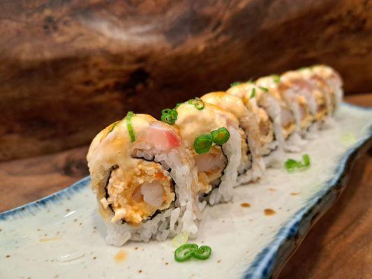 White Dragon roll - spicy crab and deep fried shrimp topped with escolar and albacore