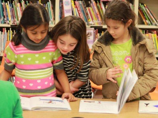 Our Aspiring Authors reviewing their books.