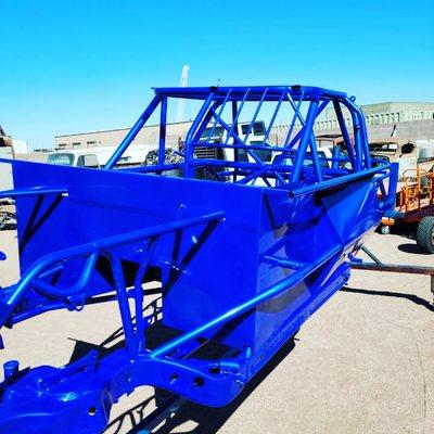 Stock car chassis powder coated in Illusion Blueberry with a clear coat.