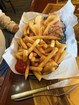 Club sandwich with fries