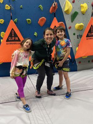 My kiddos and the team member who helped at the rock wall.