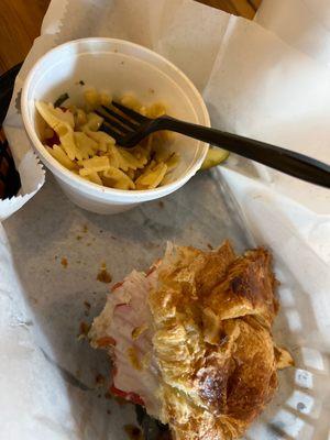 Chicken salad, croissant with lettuce and tomato, pickles, pasta as a side. The sweet tea and lemonade are also very good.