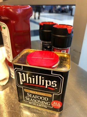 Seafood seasoning on every table and with salt / pepper and ketchup plus some with Tabasco.