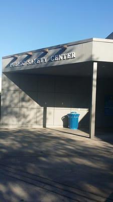 Deputies wear black and garbage cans wear blue.