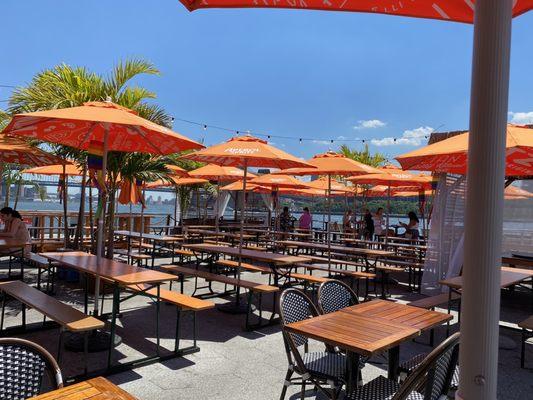 Outdoor dining area on the pier overlooking New York Harbor.