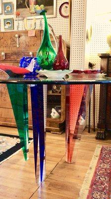 Art Deco table. glass top, 3 colored fiberglass legs. Beautiful item. $450