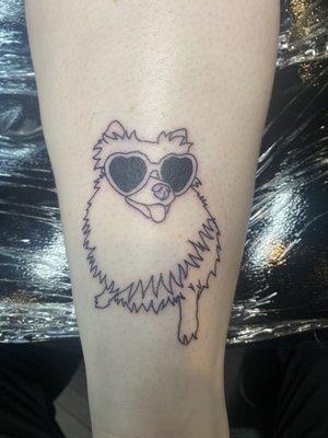 Tattoo of a Pomeranian with sunglasses