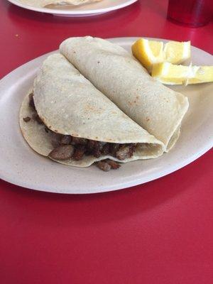 Beef tacos, perfect when you add the chopped onion/cilantro