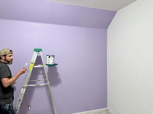 Picture of accent wall being painted