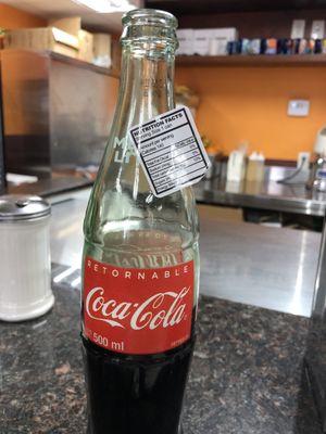 Bottled Mexican coke. Fun fact: low calorie and less sugar than plastic bottles and even canned soda which is over 200 calories.