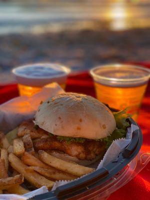 Perfect grouper Cajun Sandwich to go - with a beach view!