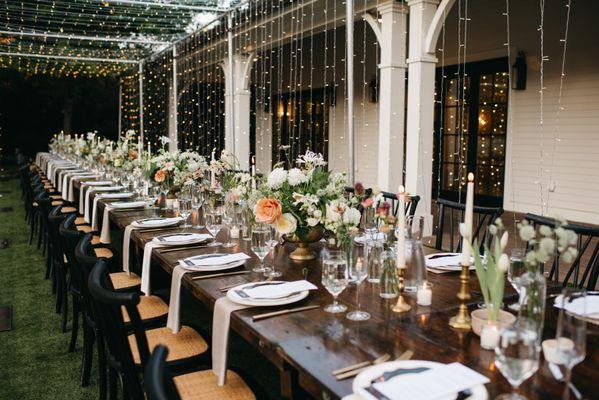 the tunnel of lights over our dinner table done by Heron Events