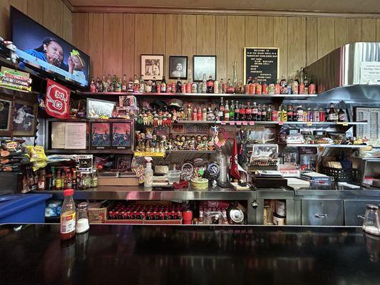 Counter seating view of original owners (pictured at top) and nostalgic knick knacks (great way to keep kids occupied)